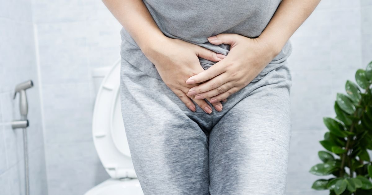 a woman facing urinary incontinence has peed in her pants